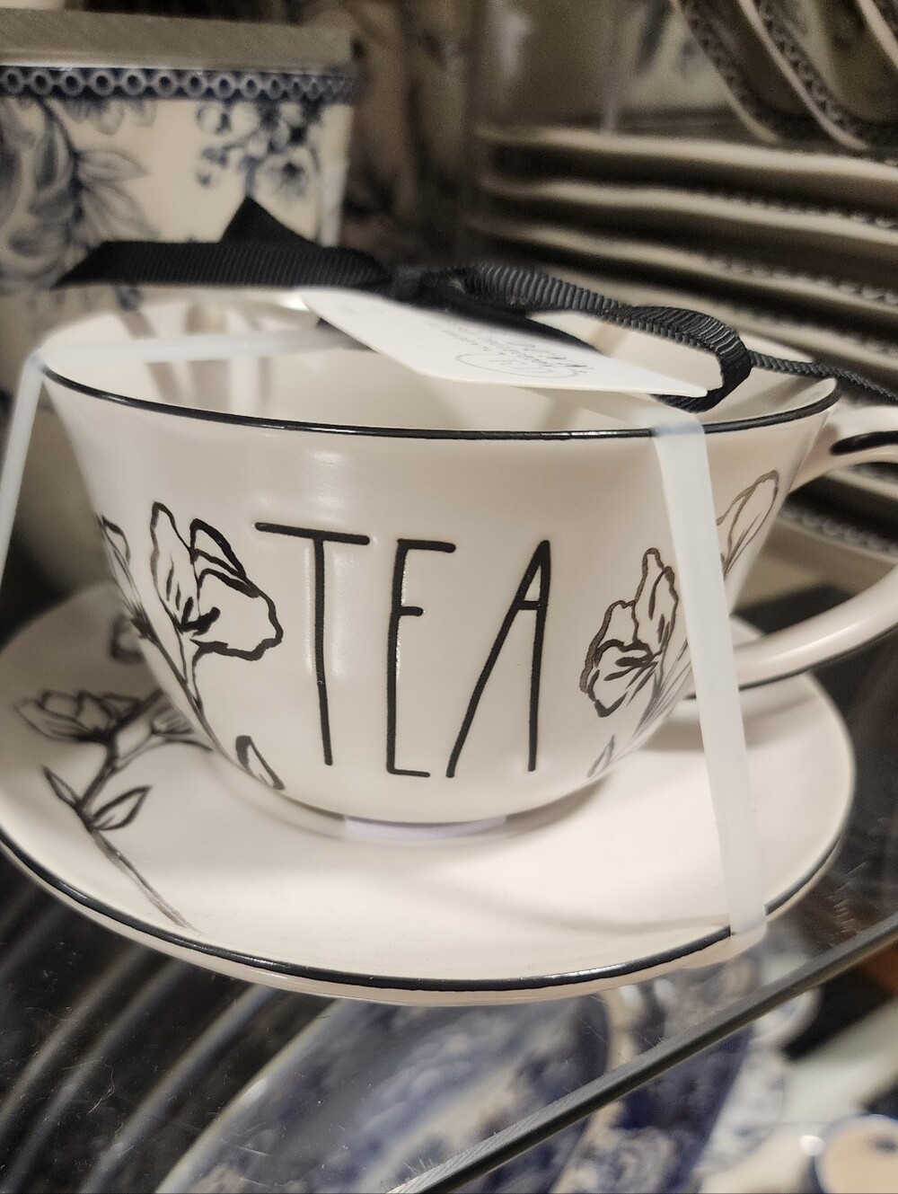 Rae Dunn Tea Cup and Saucer Set - White with Black Floral Design